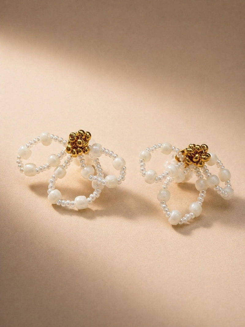 Iris bridal earrings by Vowen, looped ivory beadwork with a gold-tone flower centre