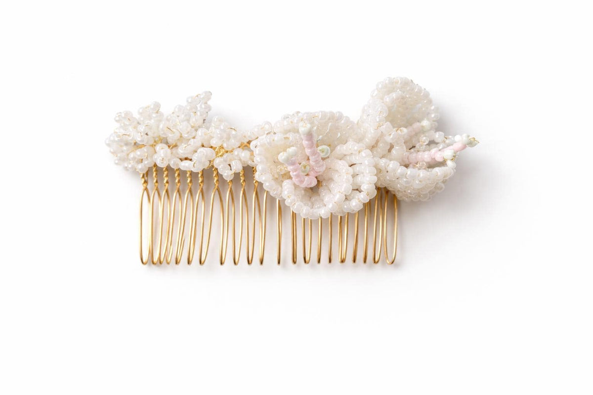 Mabel bridal hair comb by Vowen, three hand-beaded glass flowers with blush centres on a gold-plated comb